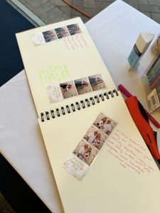 Memory book with photo booth print strips and messages for the bride and groom.